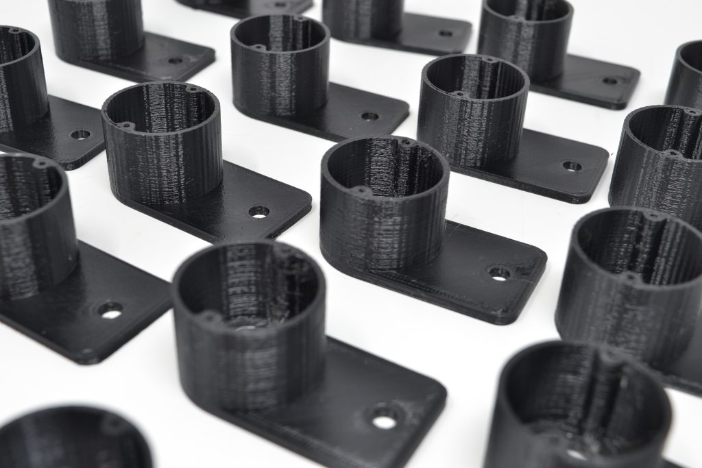 DSC 0142 multiple rows of small black 3d printed cylinders