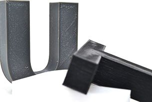 tpu 3d manufacturing Black TPU letter t and grey letter U